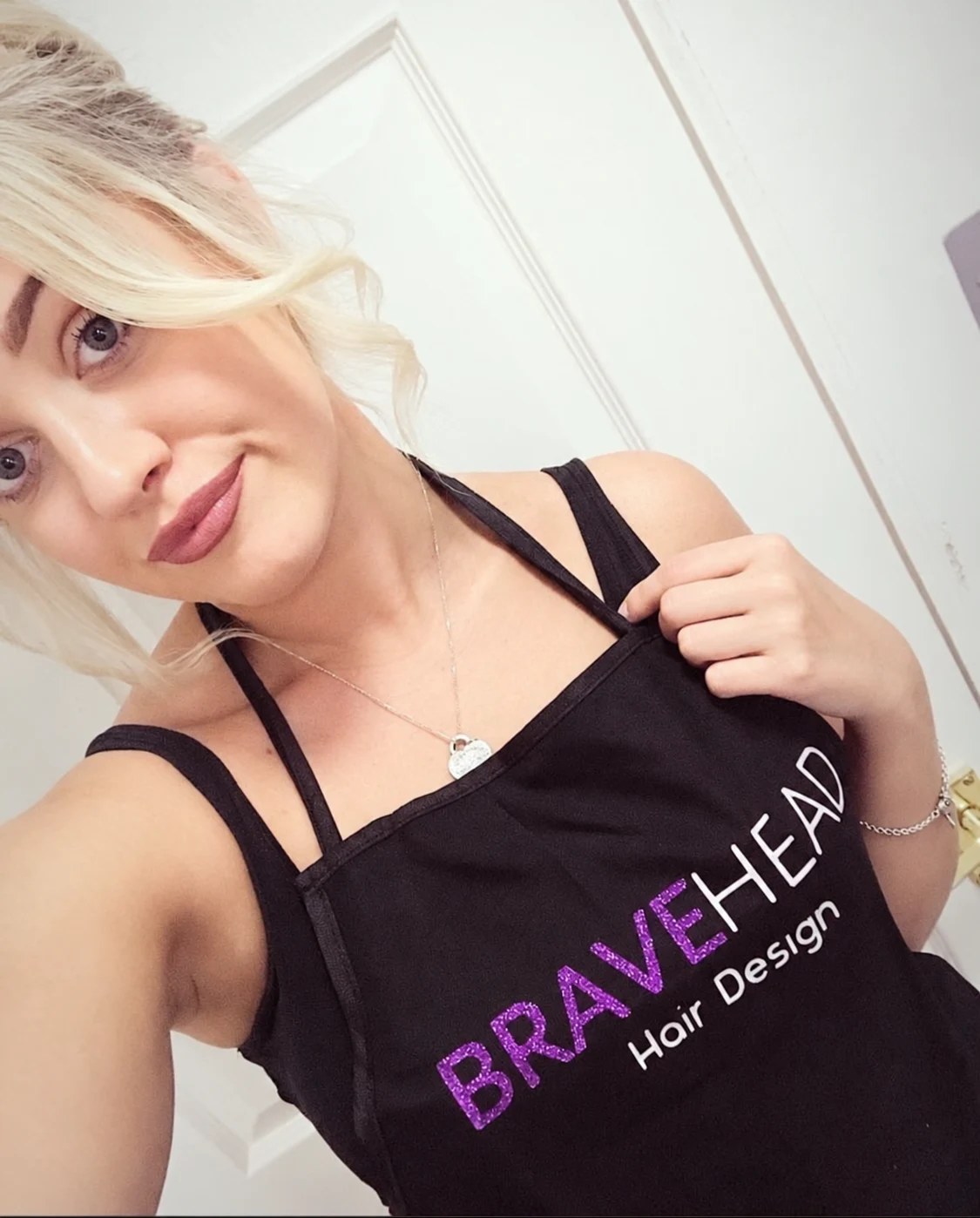 Leanne wearing her BRAVEHEAD Hair Design apron